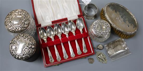 A cased set of six silver teaspoons and other items including silver mounted toilet jars, coins etc.